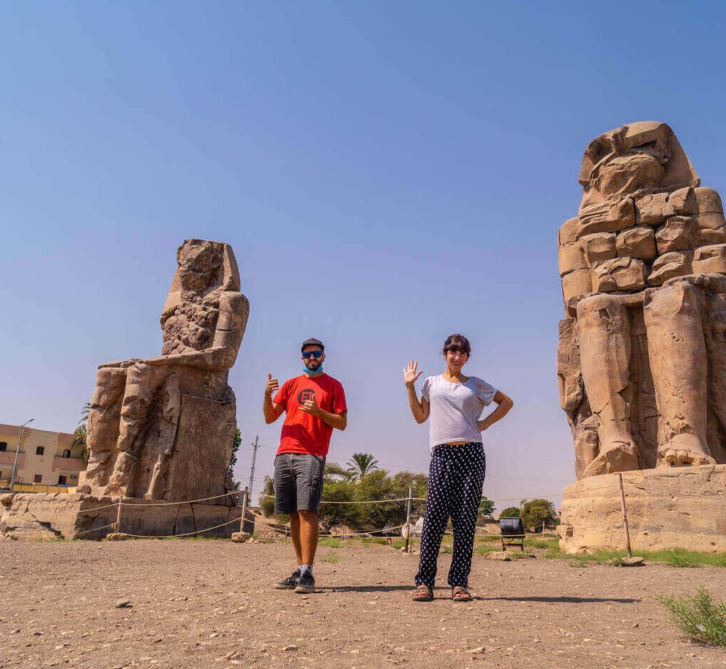 A-picture-of-a-couple-from-their-visit-to-the-two-statues-of-Memnon-in-Luxor
