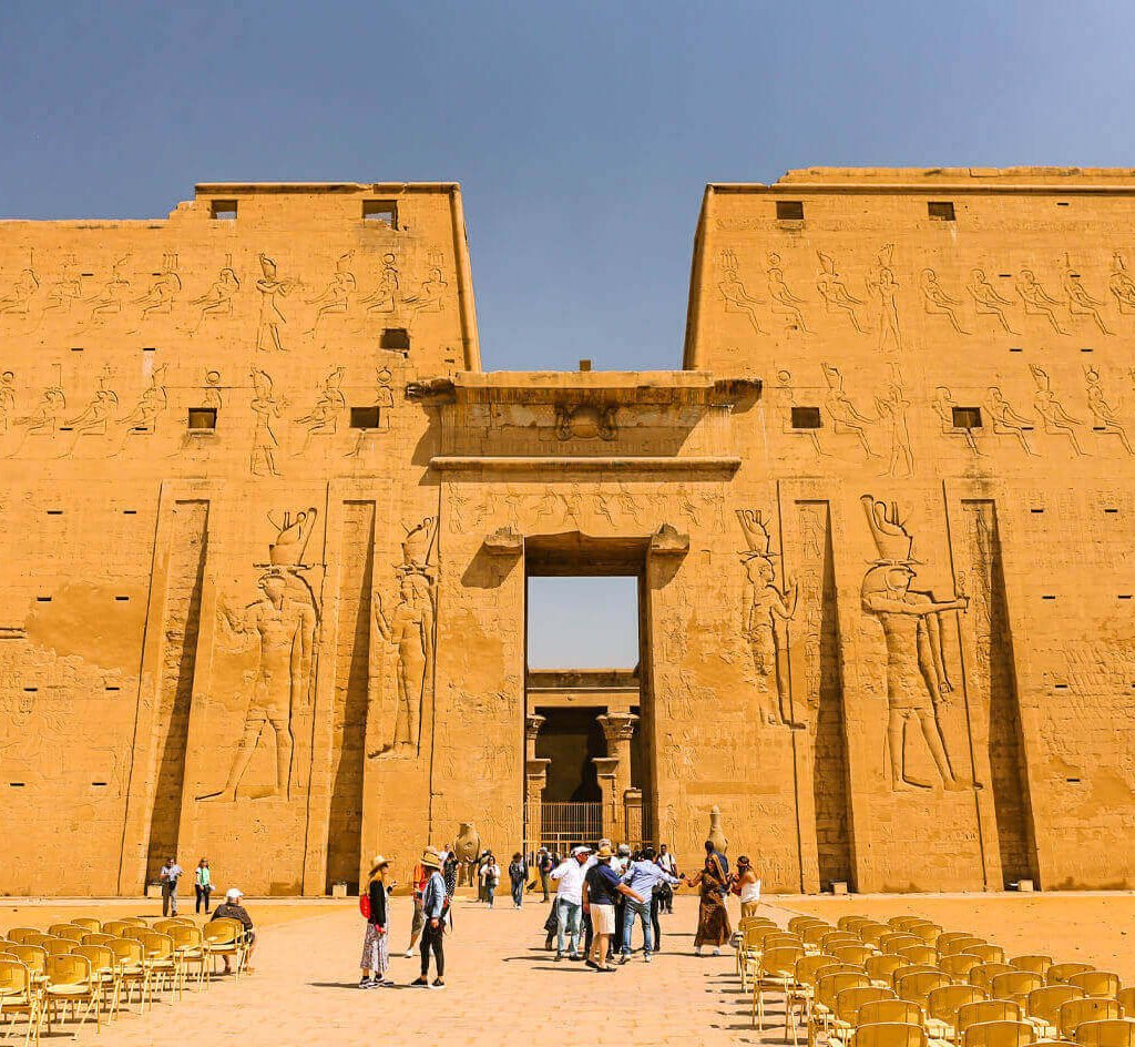A-picture-of-some-visitors-in-front-of-the-magnificent-Edfu-Temple