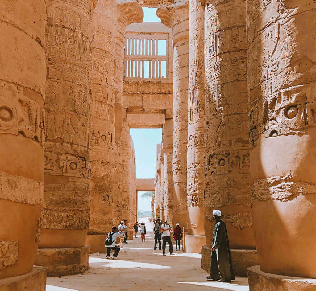 A-picture-of-some-visitors-near-the-columns-of-Karnak-Temple