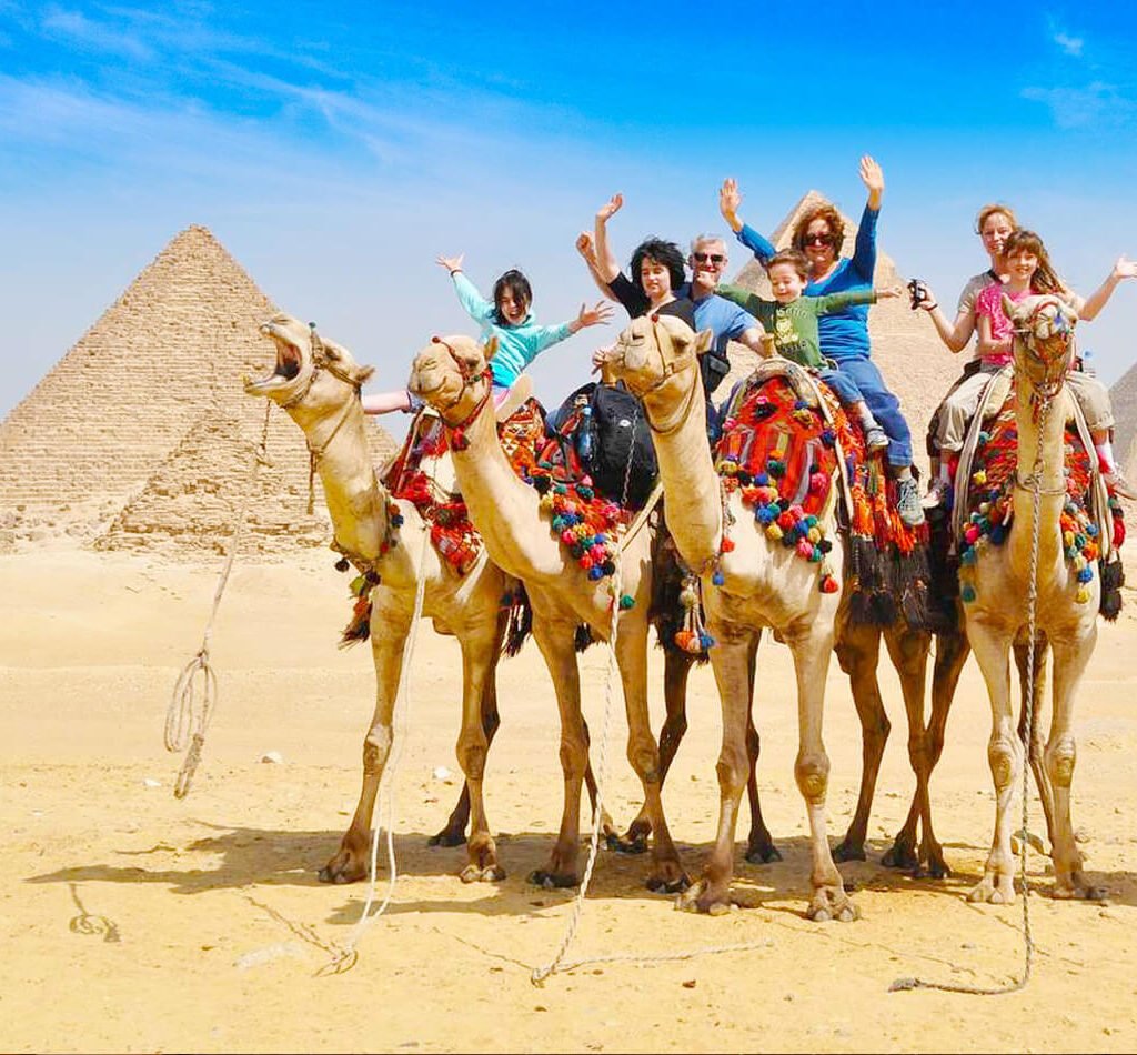 A-wonderful-photo-of-a-family-inside-the-pyramids-and-riding-camels