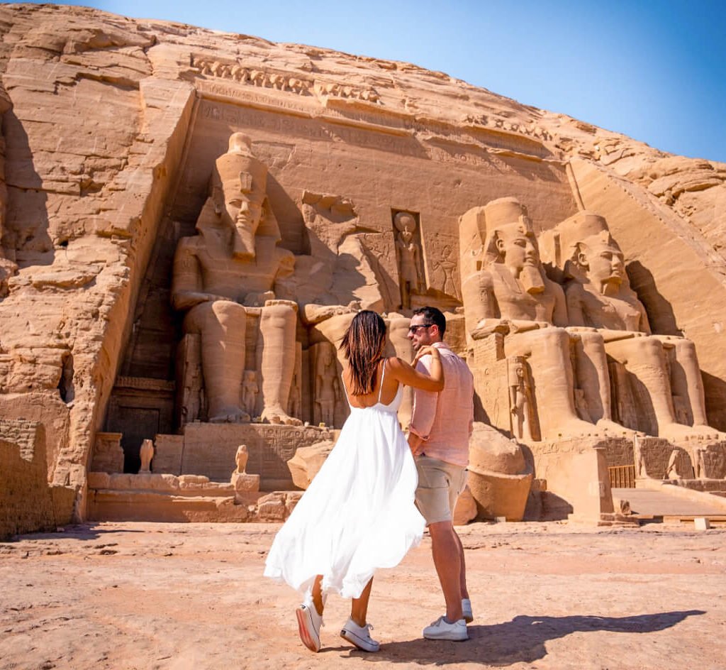 a-photo-of-a-couple-in-front-of-abu-simbel-temple-in-aswan